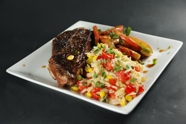 Sous vide ribs with sweet apples and orzo.